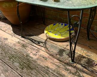 RP65 - $30. Wrought Iron Table with Glass Top. Measures 18" x 31" x 17" tall.