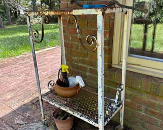 RP70 - $75. Measures. 13" x 24.5" x 38" tall. Wrought Iron Cart with Wheels. (No permanent top)