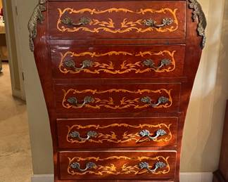 Chinoiserie style mahogny chest with 7 drawers and bronze ormolu mounting elegantly hand-painted with feathery detail. $500