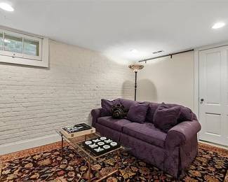 Custom covered Sherrill Sofa! Handmade coffee table - copper tubing and fleur de lis garden accents, room size rug and the most beautiful backgammon set ever!