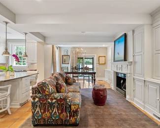 Like new IKAT sectional sofa, swivel barstools and the cabinets are PACKED with books, frames, pottery, art and more.