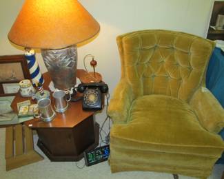 Cute vintage living room chair ( It's part of a perfect pair), vintage octagon table, decor lamp & vintage rotary phone.
