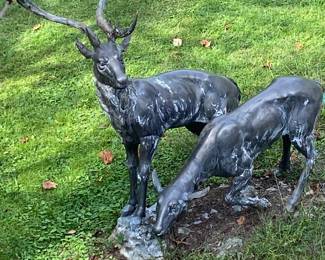 Life size buck and doe bronze