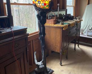 Art Deco bronze floor lamp with multi color glass globe