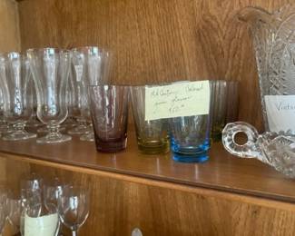 close up of glass items in dining area cabinet