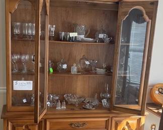 china cabinet in dining area with display