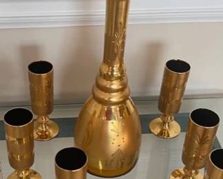sherry bottle and gold goblets