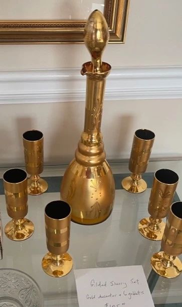sherry bottle and gold goblets