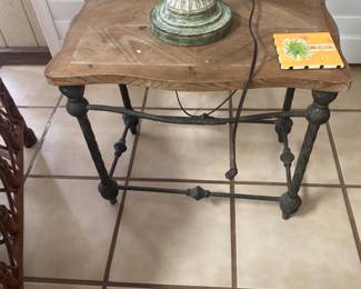 Iron legged table with wood top