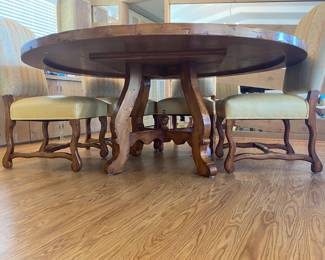 Fremarc Design 25" solid wood pedestal table and 8&nbsp;leather seated high back chairs.&nbsp;