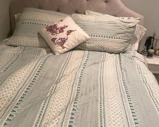 Quilted Headboard and bed.   Bedding sold separately . 