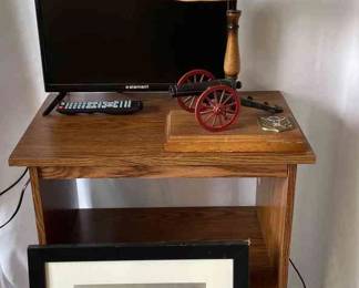 Civil War Model Cannon Table Lamp, Element Tv And Remote, Pressed Wood Open Cabinet On Wheels, And Life Picture Frame