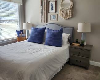 Bed with Upholstered Nail Head Trim Headboard