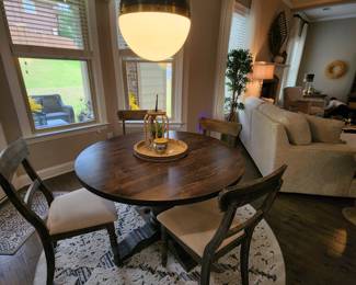 Charming Round Dining Table and Chairs