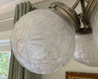 Close up of the renowned Muller Frere birds on the globes