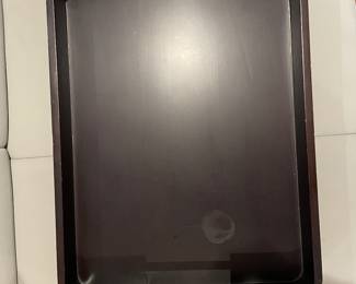 has a white ring from a hot or cold drink