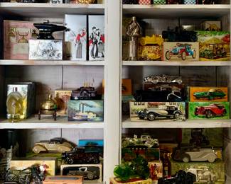 Large assortment of NOS Vintage Full Avon bottles with their boxes.