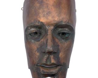 Unusual artisan crafted hammered and formed copper mask 