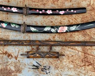 Vintage Weaponry: Indonesian carved bone segmented dragon blowgun with darts & 2 vintage Japanese Wakizashi black lacquered Samurai daggers