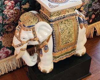 Elephant garden seat on a pedestal.