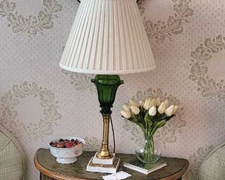 Heart shaped Venitian mirror. Small demi lune table. Antique green glass lamp.