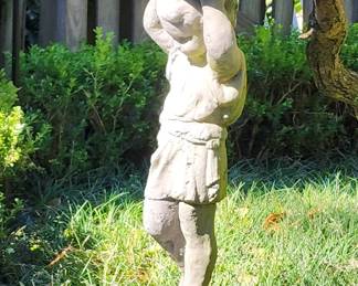 Walkup the driveway and enter through the back door.