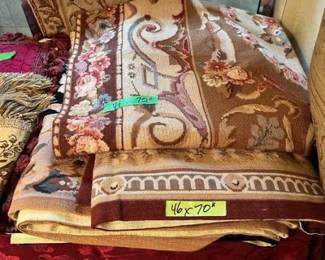 There are MANY hand sewn tapestries. Ranging in price. The most expensive was $100 so they will be $50 or less on Wed. 