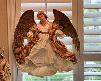 This is a papermache angel. He was $40. Will be $20 on Wed. He'd be great over your nativity or a beautiful Christmas setting
