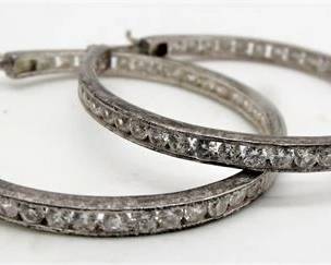 Lot 120   1 Bid(s)
Sterling inside out hoop earrings