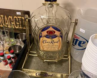 Crown Royal bottle on a pouring cradle
