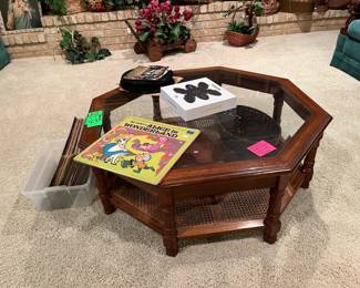 Octagon beveled glass cocktail table w/ cane bottom shelf!