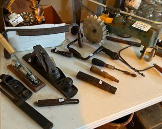 Some vintage tools and a tractor sprinkler