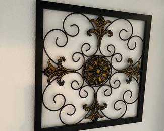 We have a pair of these metal art pieces!