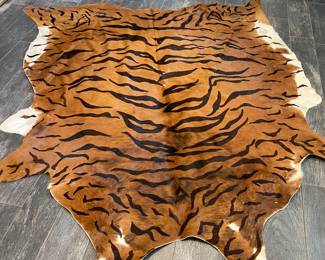Cow hide real - made to look like tiger