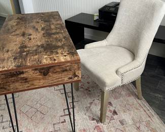 Side view of office desk chair and rug