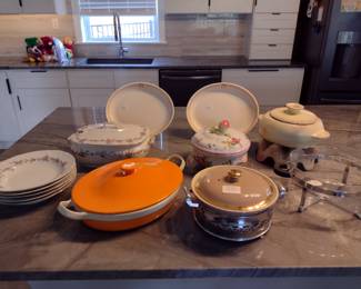 Casseroles and antique covered soup tureen and bowls