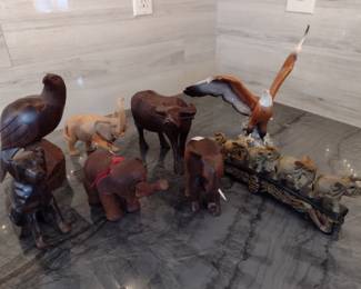 Wooden animal collection. Walking elephants brought back from China.