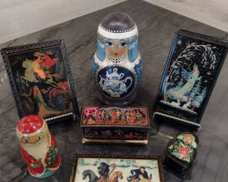 Russian collection. Lacquer boxes and nesting dolls.