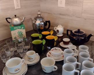 Coffee and tea collection. Mugs from England and Italy.