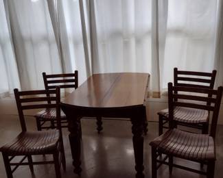 Antique drop leaf table and chairs.