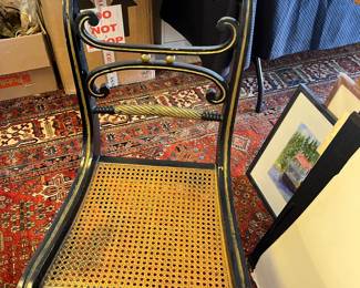 $90 each Pair of antique side chairs with gilt on the ebonized wood and caning in perfect condition.