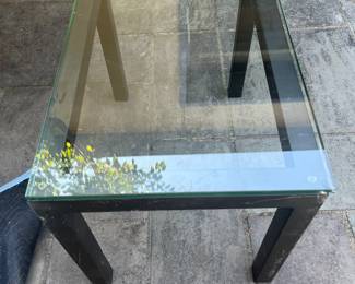 $130  Glass top and iron base table.  30"w x 20"d x 22"h.