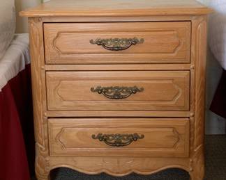 Davis three drawer bedside table.  24"w x 17"d x 25"h.  matches the bedside table in the next photo in color and make.  sold as a set