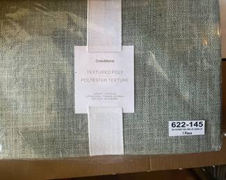 $90 each includes hardware which is sold separetly at Crate & Barrel for $25 .  Crate & Barrel new in pkg. textured poly drapery panels.  Each 52"w x 84"h.   $90 plus tax plus $24.95 for the rings each pkg new and still available at Crate & Barrel.  6 available