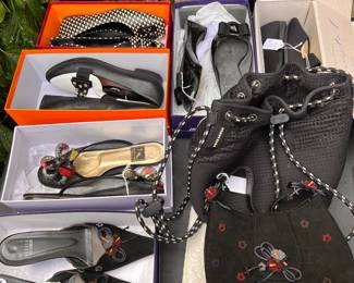 Designer shoes, clothing and handbags for sale during in-person shopping.  shoes range from size 7 -9.