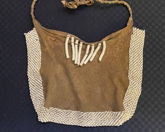 hide and bead bag for sale during in-person shopping