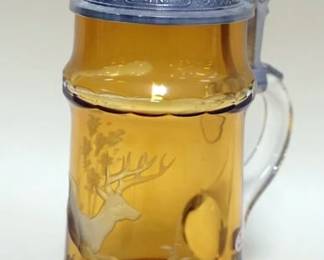 1055	BAVARIAN CRYSTAL AMBER ETCHED GLASS STEIN JEWELED PEWTER LID, APPROXIMATELY 9 IN H. SIGNED & NUMBERED
