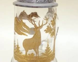 1059	BAVARIAN CRYSTAL STEIN WITH ETCHED GLASS, SCENE HAVING GILT ACCENTS, JEWELED EMERALD GREEN PEWTER LID, APPROXIMATELY 9 IN H, GLASHUTTE
