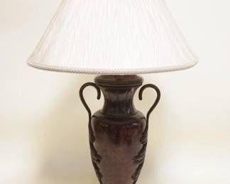 1117	TABLE LAMP IN THE FORM OF A DOUBLE HANDLED URN W/A BRONZE FINISH
