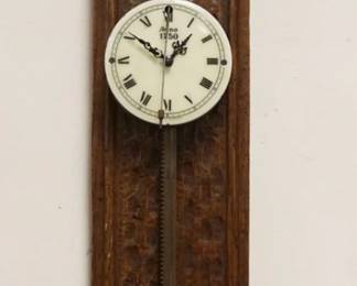 1158	CONTEMPOARARY ANNO SAW CLOCK, APPROXIMATELY 6 IN X 28 IN HIGH
